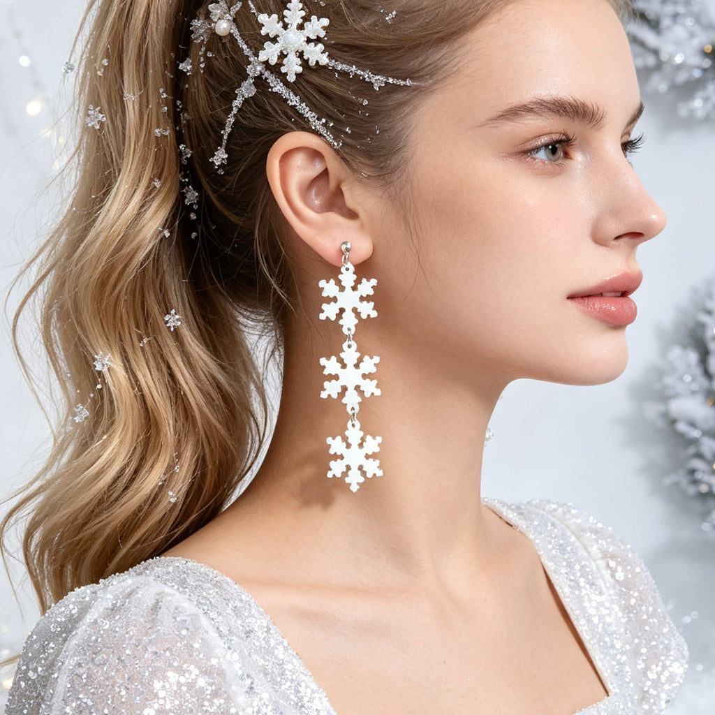 Silver snowflake dangle drop earrings with layered dangling snowflake charms
