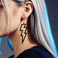 Black lightning bolt dangle earrings with silver hooks