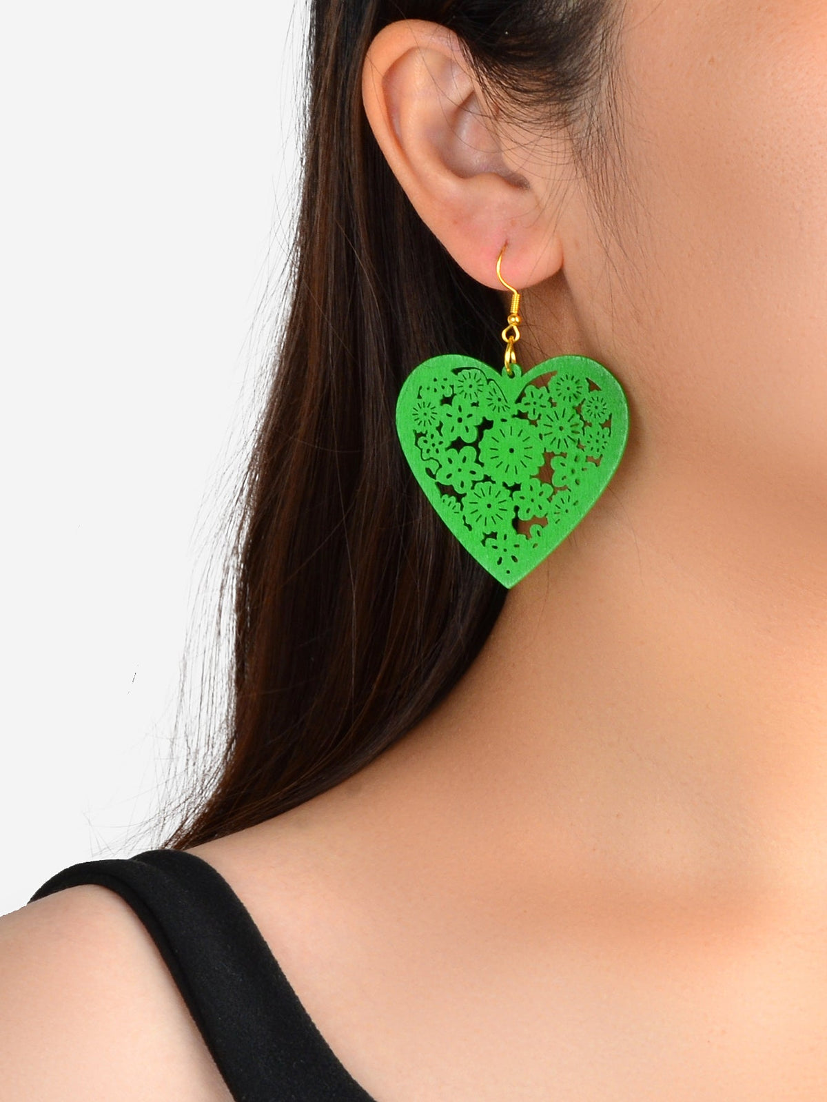 Green heart dangle earrings with hollow floral cutout and gold hooks