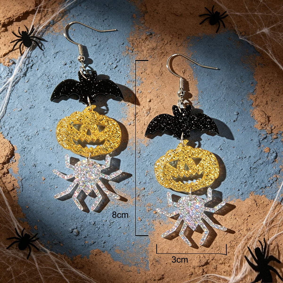 Halloween drop earrings with black bat, gold pumpkin, silver spider; approx 8 cm long