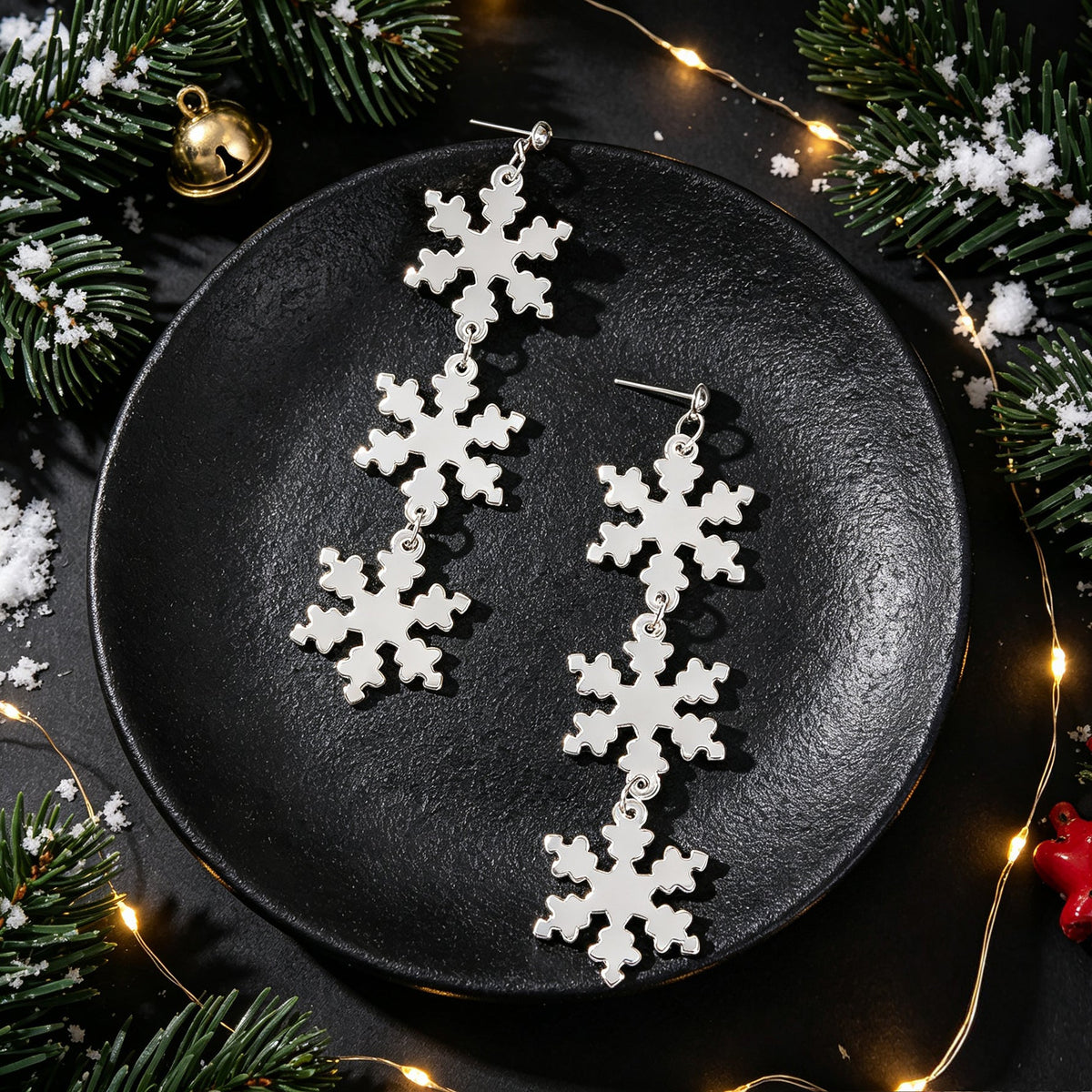 Silver snowflake dangle earrings with long clustered snowflake charms, pair