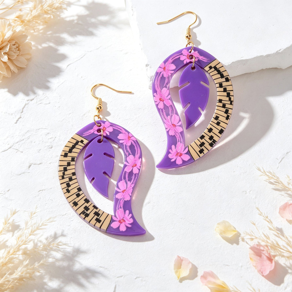 Purple floral leaf dangle earrings with gold hooks and piano-key rim
