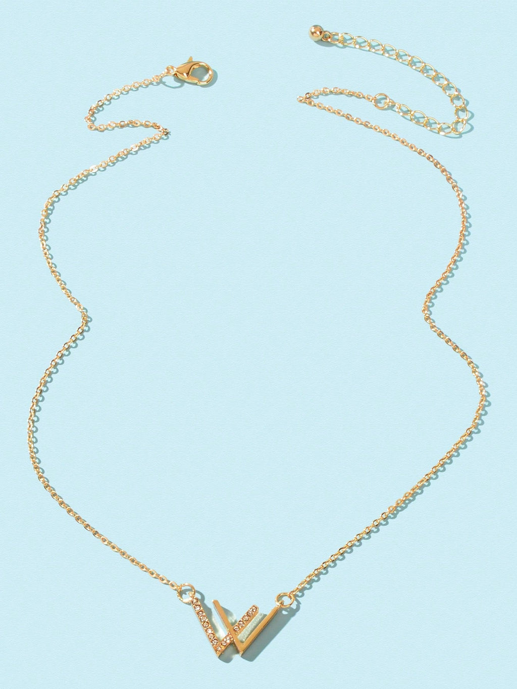 Gold rhinestone V charm necklace with V pendant and chain links