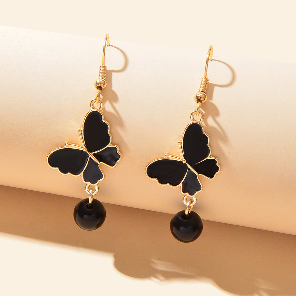 Black butterfly dangle earrings with dark bead drops