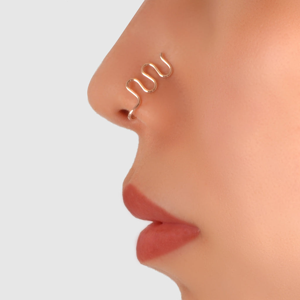 Rose gold faux nose piercing clip, wavy geometric detail on nose