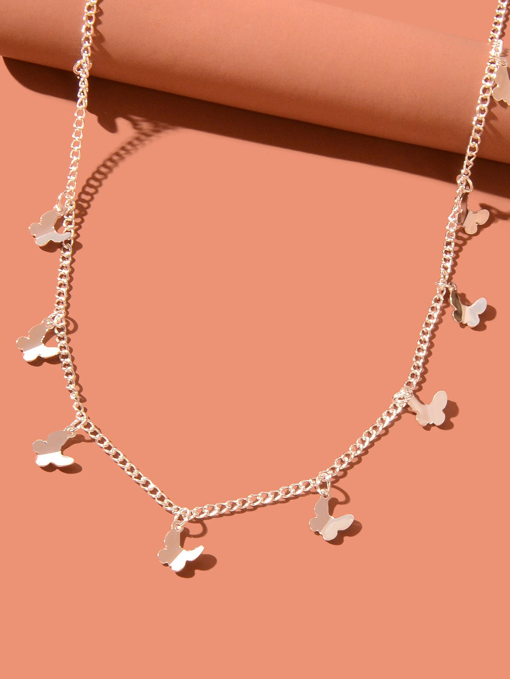 Silver-tone butterfly charm choker necklace with small butterfly pendants