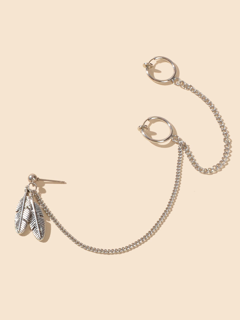 Silver-tone long ear-chain with hoop cuffs and a feather charm