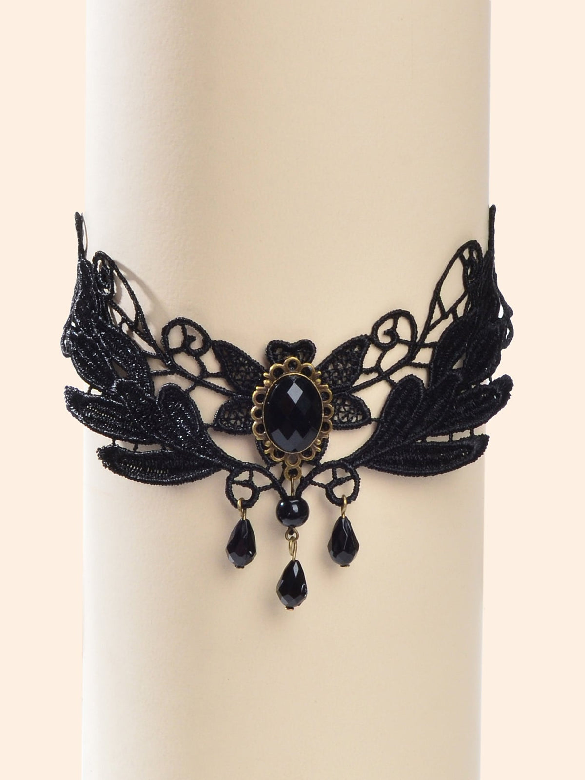 Black lace leaf choker with ornate oval gem clasp and three dangling teardrop charms
