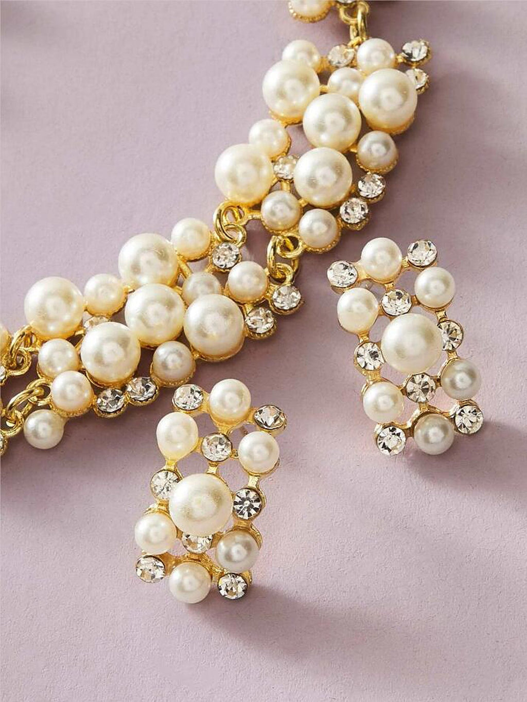 Gold-tone pearl rhinestone necklace with matching clustered stud earrings