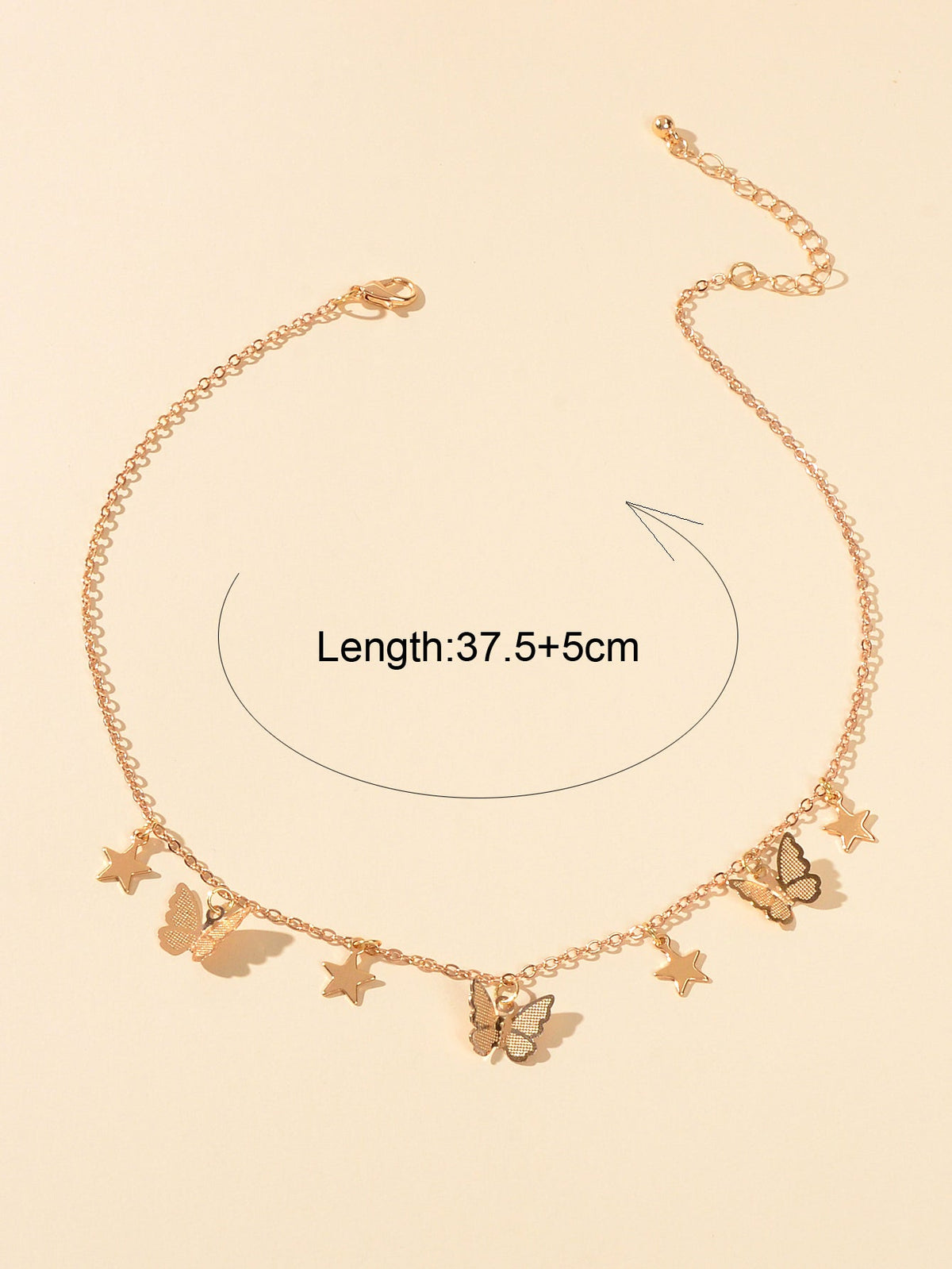 Gold-tone star and butterfly charm collar necklace with adjustable chain