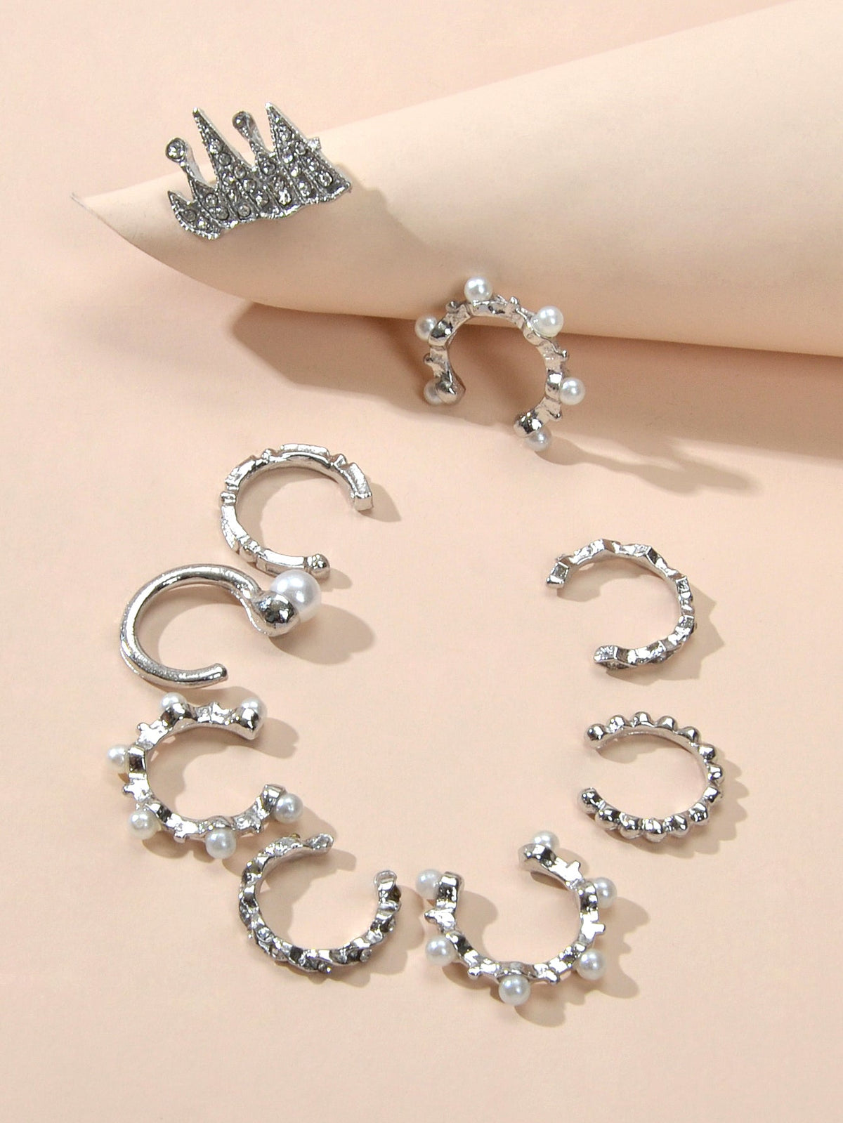 Silver ear cuff set, assorted styles: crescent hoops, beaded rings, and spiky top