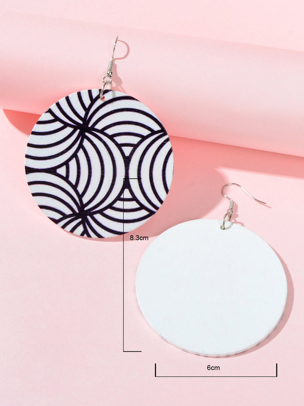 Round zebra swirl earrings with silver hooks; size shown as 8.3 cm and 6 cm