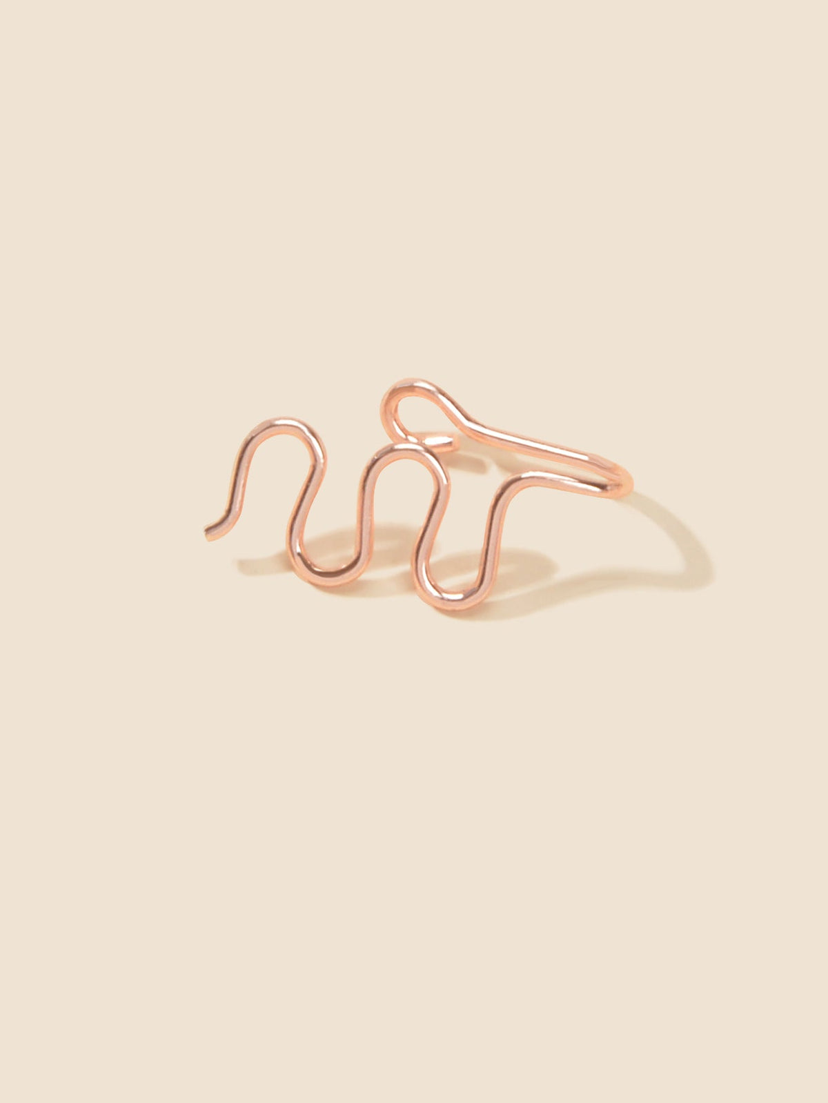 Rose gold faux nose piercing, wavy S design with straight bar