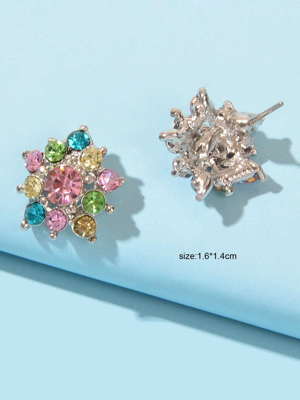 Colorful rhinestone star stud earrings with multicolor stones and visible back posts