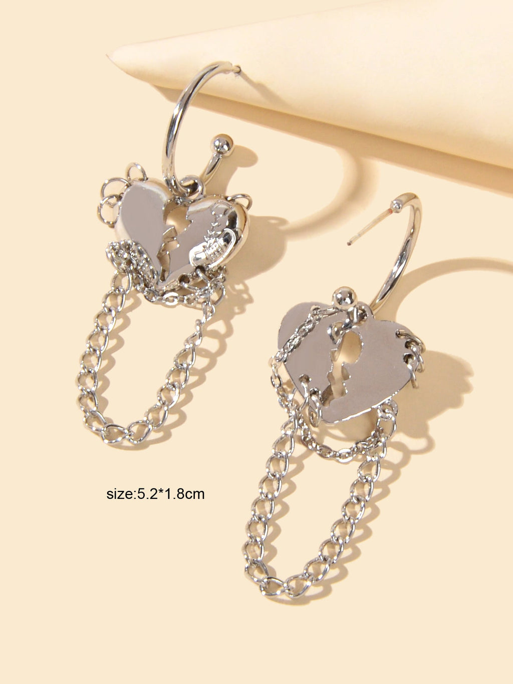 Silver heart charm hoop earrings with long dangling chain fringe