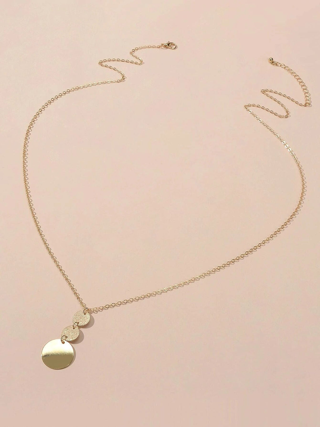 Gold-tone double necklace with heart and round disc pendants
