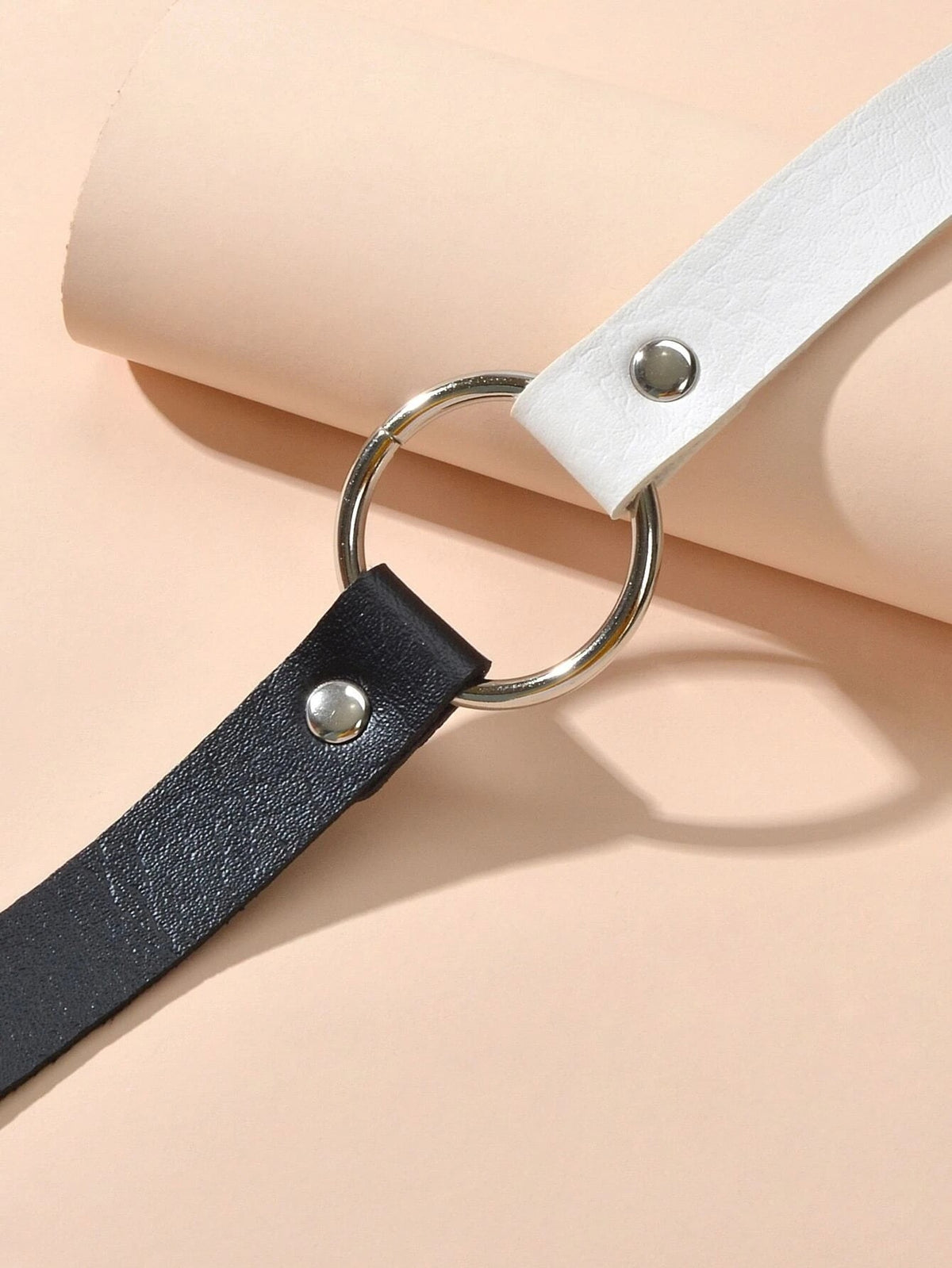Black and white PU leather choker detail with round silver ring and rivet stud