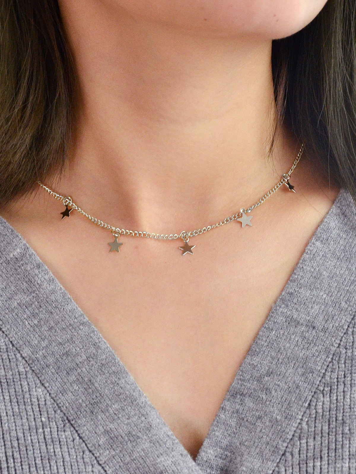 Silver-tone star charm choker necklace with five-point star pendants
