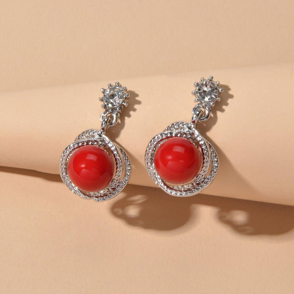 Silver-tone red round drop earrings with rhinestone frame and crystal flower tops