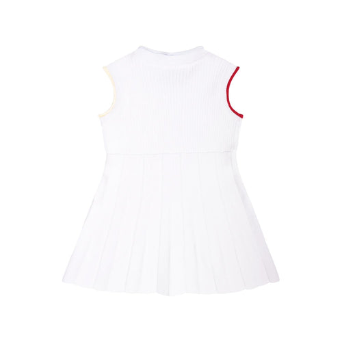 Baby white sleeveless dress, pleated skirt and ribbed bodice with red armhole trim