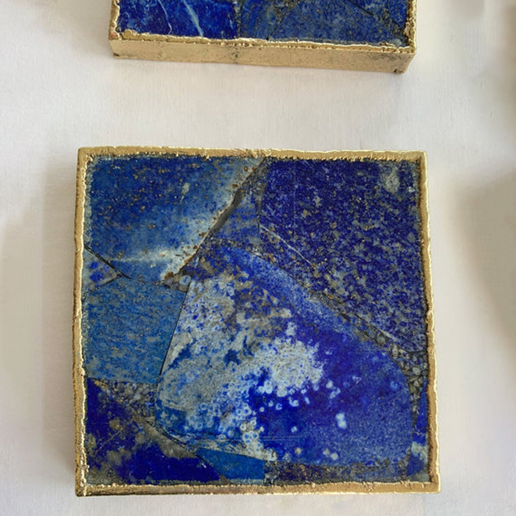 Single square lapis blue coaster with gold-toned edge and blue mosaic texture