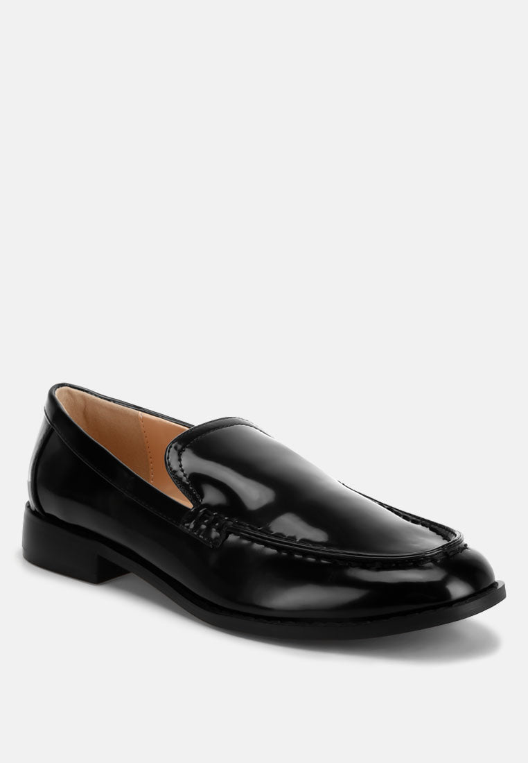 Black pleather loafer with stacked heel and rounded moc toe, front angle