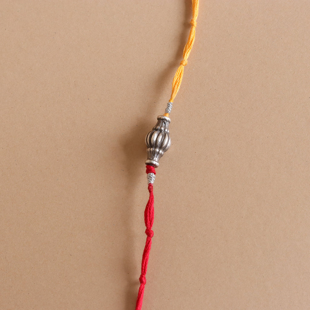 Sliver Ovol Beads Rakhi
