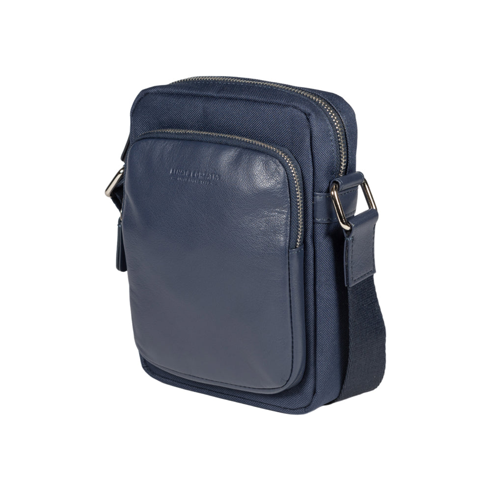 RB2002D | Nylon/Vera Leather Shoulder Bag, with light grain. Zipper closure and adjustable shoulder strap - Blue color - Size: 15.5 x 21 x 7 cm. Packaging: Non-Woven Fabric Bag - Bag at Dealshubindia
