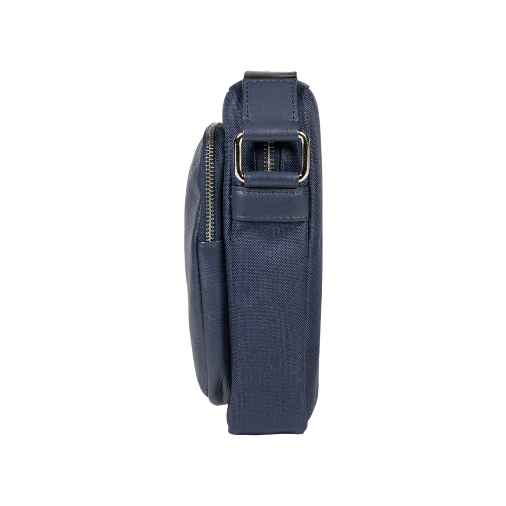 RB2002D | Nylon/Vera Leather Shoulder Bag, with light grain. Zipper closure and adjustable shoulder strap - Blue color - Size: 15.5 x 21 x 7 cm. Packaging: Non-Woven Fabric Bag - Bag at Dealshubindia