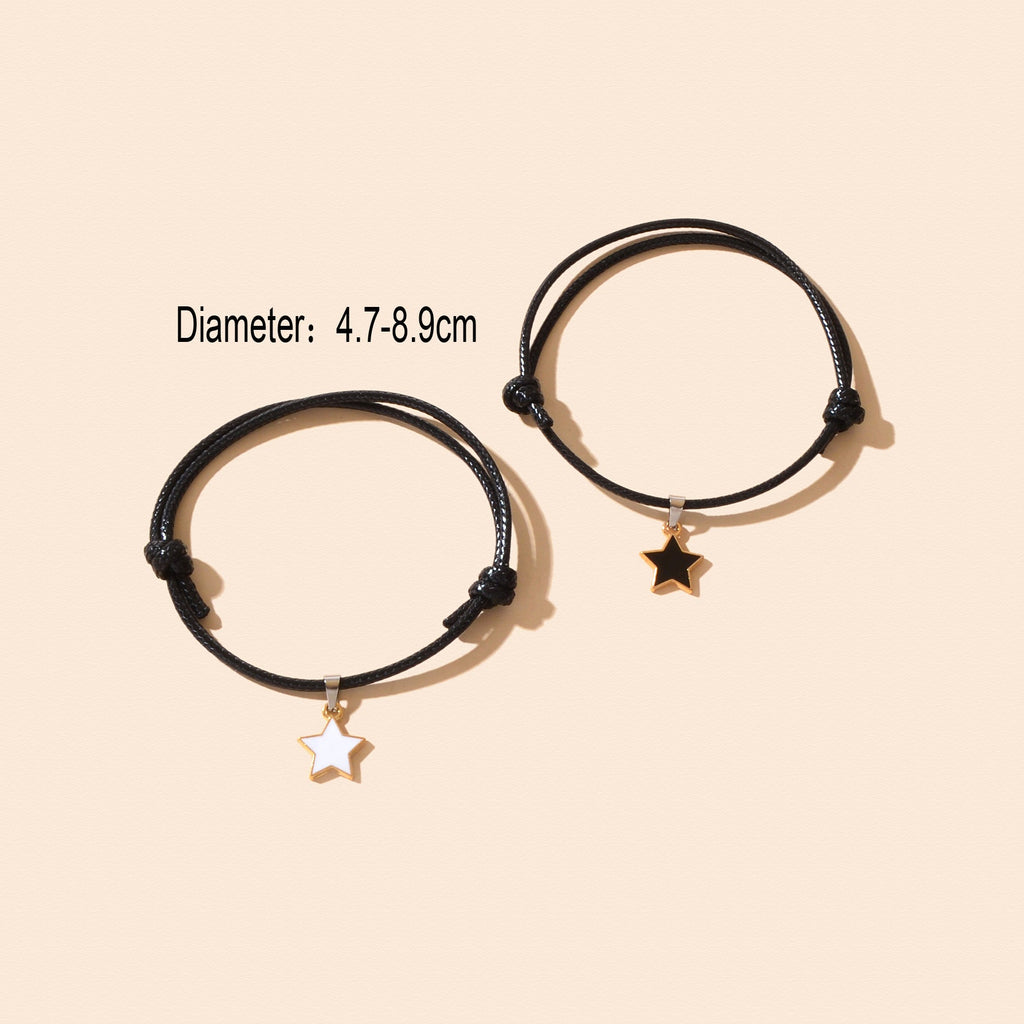 Pair of adjustable black rope star bracelets, diameter 4.7–8.9 cm