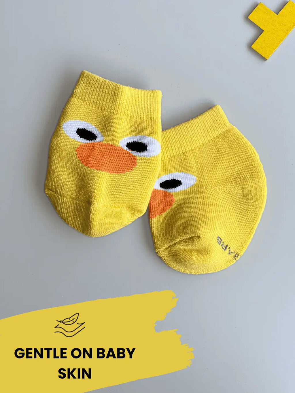 Air Garb brand baby combo socks for infants; a 6-pair set of soft cotton socks featuring pineapple, watermelon, cherry, and cute character face designs in vibrant colors like yellow, red, and blue.