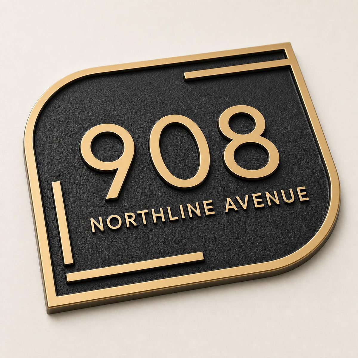 Antique brass address plaque featuring 908 and Northline Avenue on dark backing