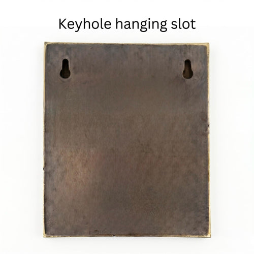 Metal plaque backing with two keyhole hanging slots