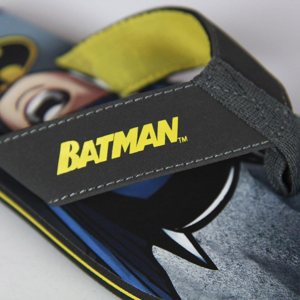 Batman flip flops close-up: black strap with yellow BATMAN lettering