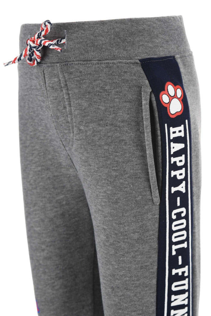 Grey joggers with navy pocket panel and vertical white text with paw logo