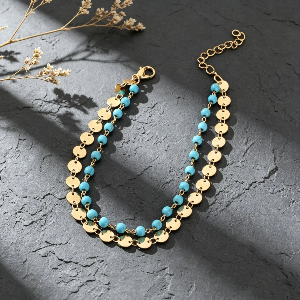 Gold-tone layered anklet with turquoise beads and round disc coin charms