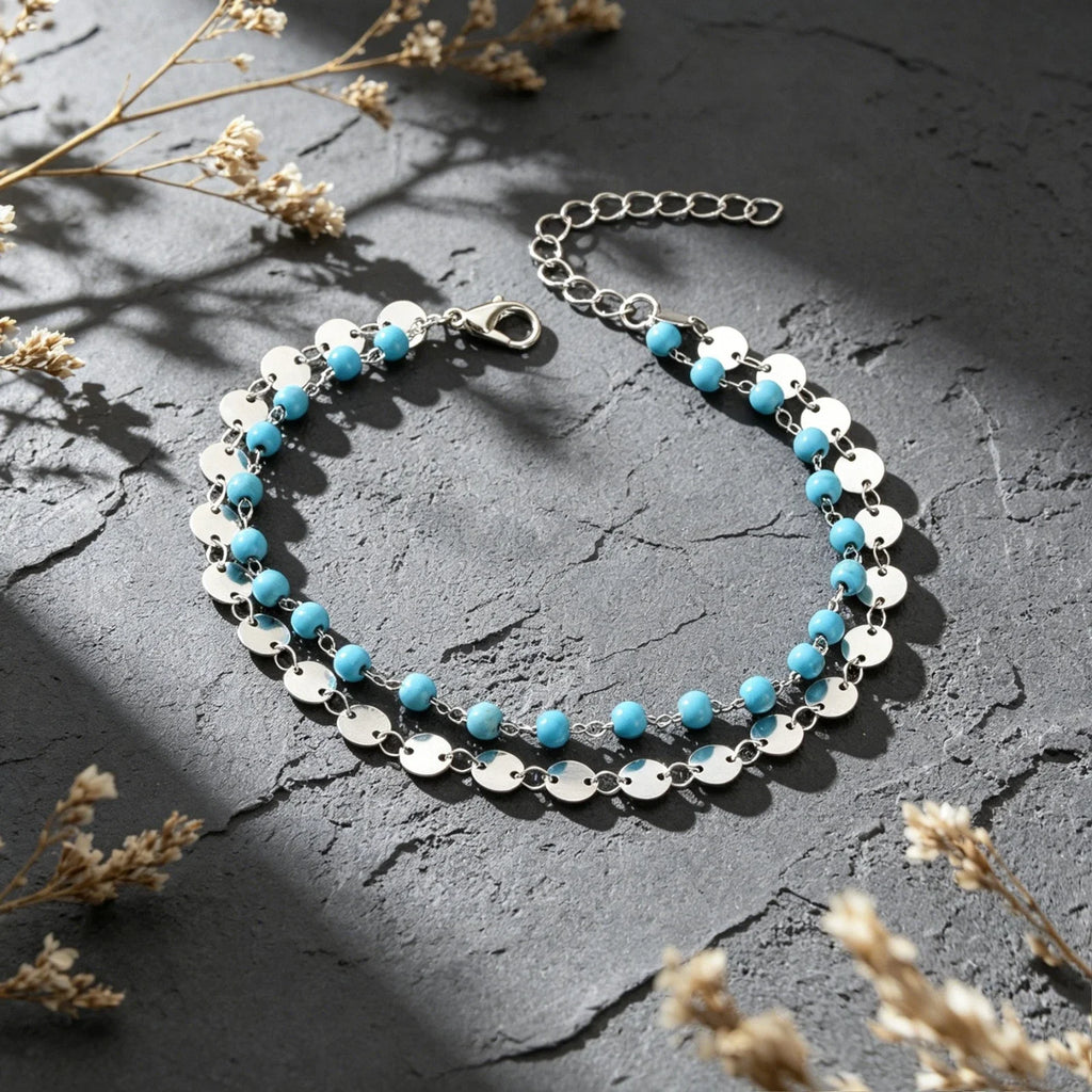 Silver-tone beaded disc anklet with turquoise beads and circular charm links